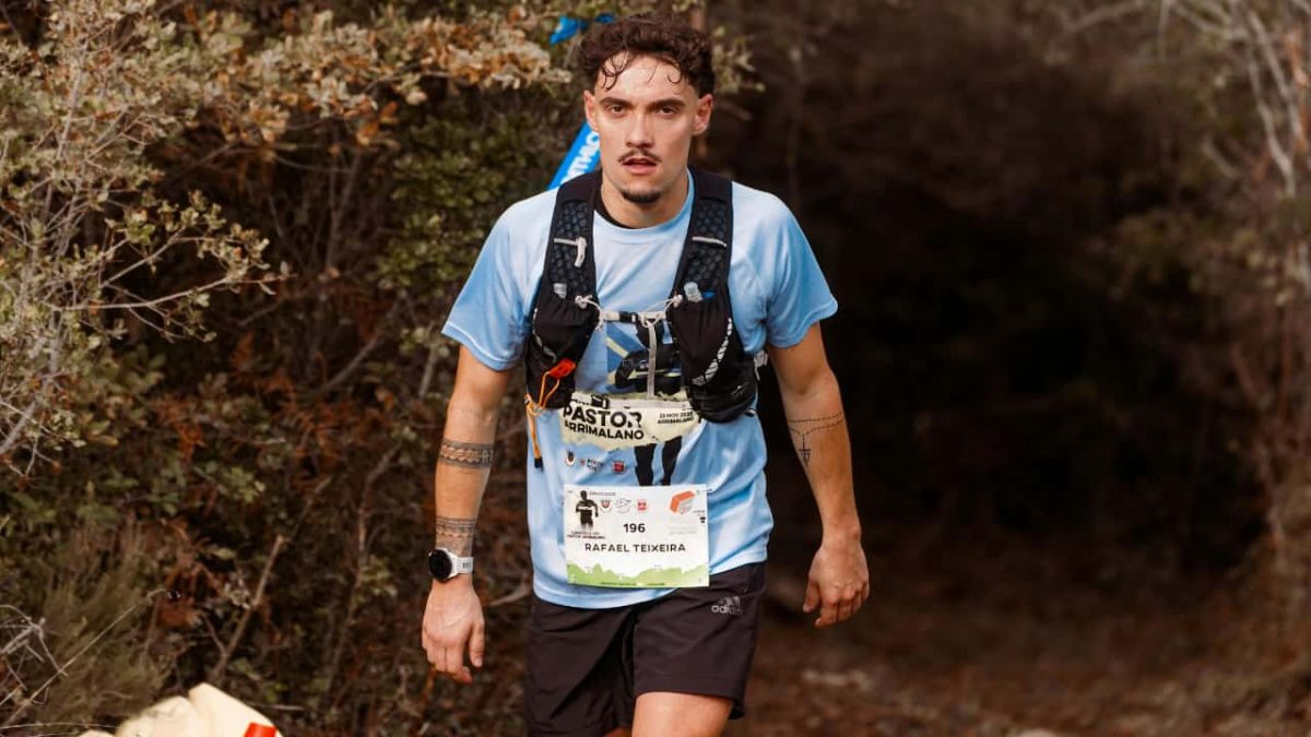 Runner Emerging from Forest Path