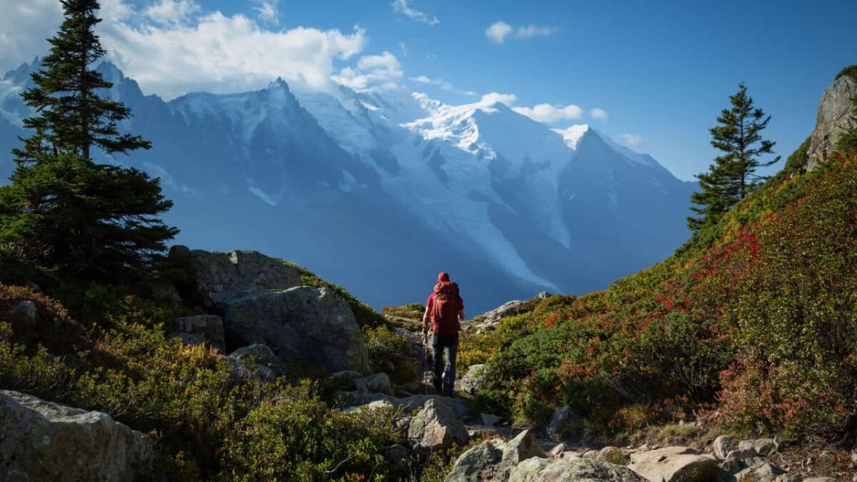 A man hiking on the famous Tour du Mont Blanc near Chamonix, France.